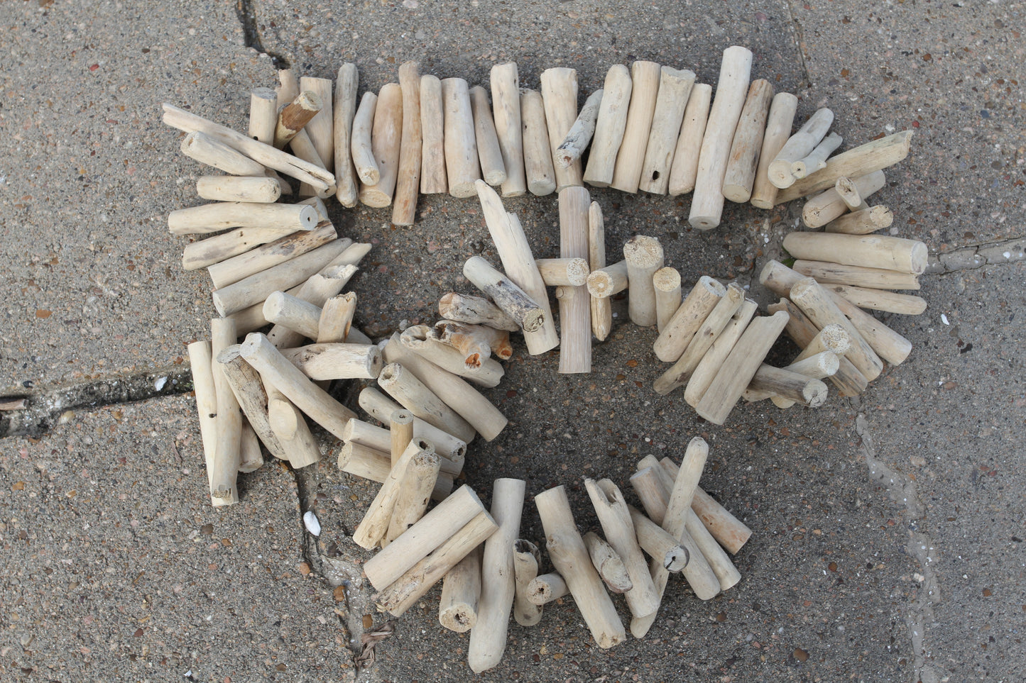 Driftwood-style Garland made of natural wood and hangs 6 ft. tall, a MUST HAVE for all sea lovers! G-102