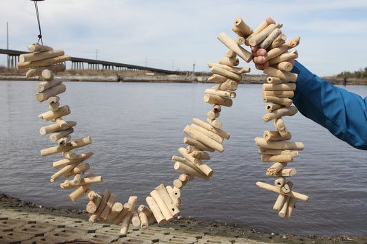 Driftwood-style Garland made of natural wood and hangs 6 ft. tall, a MUST HAVE for all sea lovers!  G-102